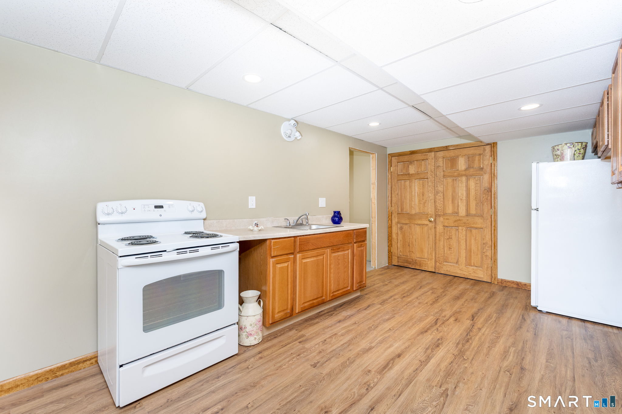 85 Salem Road East Haddam, CT 06415 - Photo 35 of 39 a kitchen with a stove a sink and a refrigerator