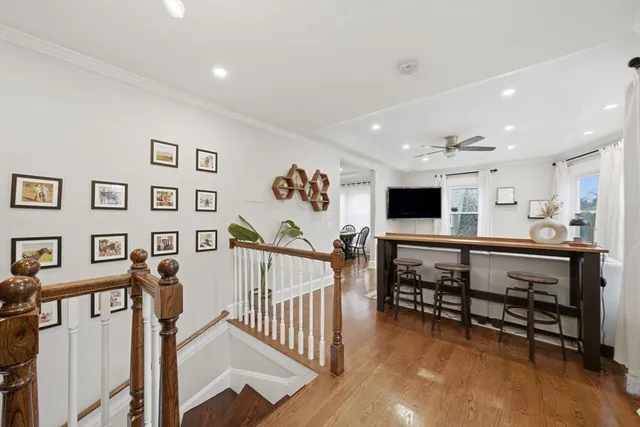 a view of a livingroom with furniture and a flat screen tv