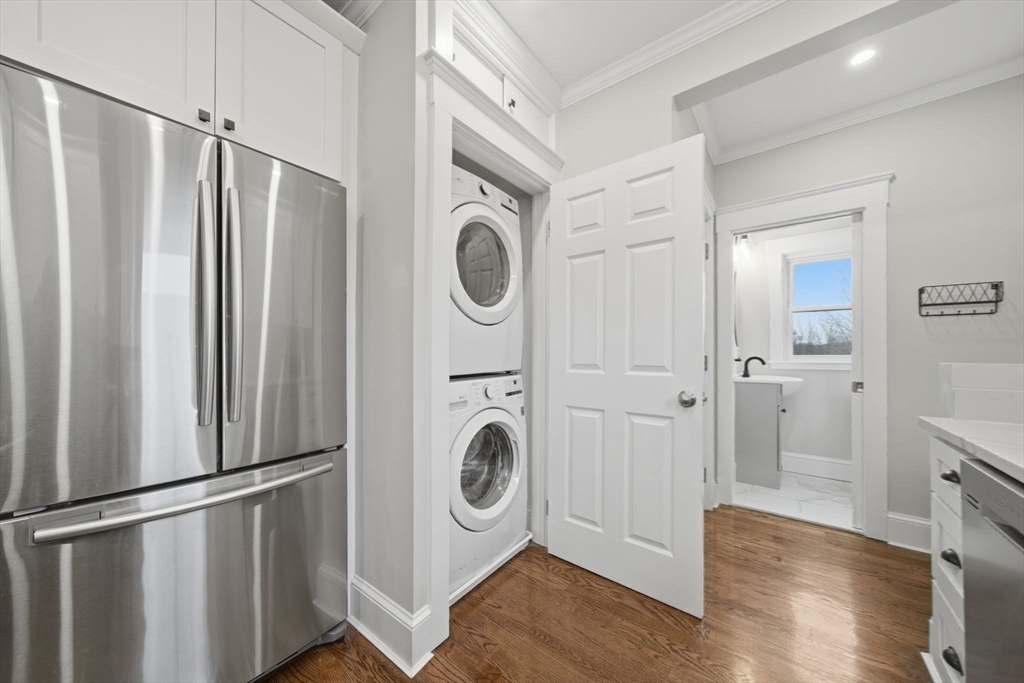 24 Prescott Street, Unit 3 Boston, MA 02136 - Photo 13 of 29 a view of a kitchen with washer and dryer