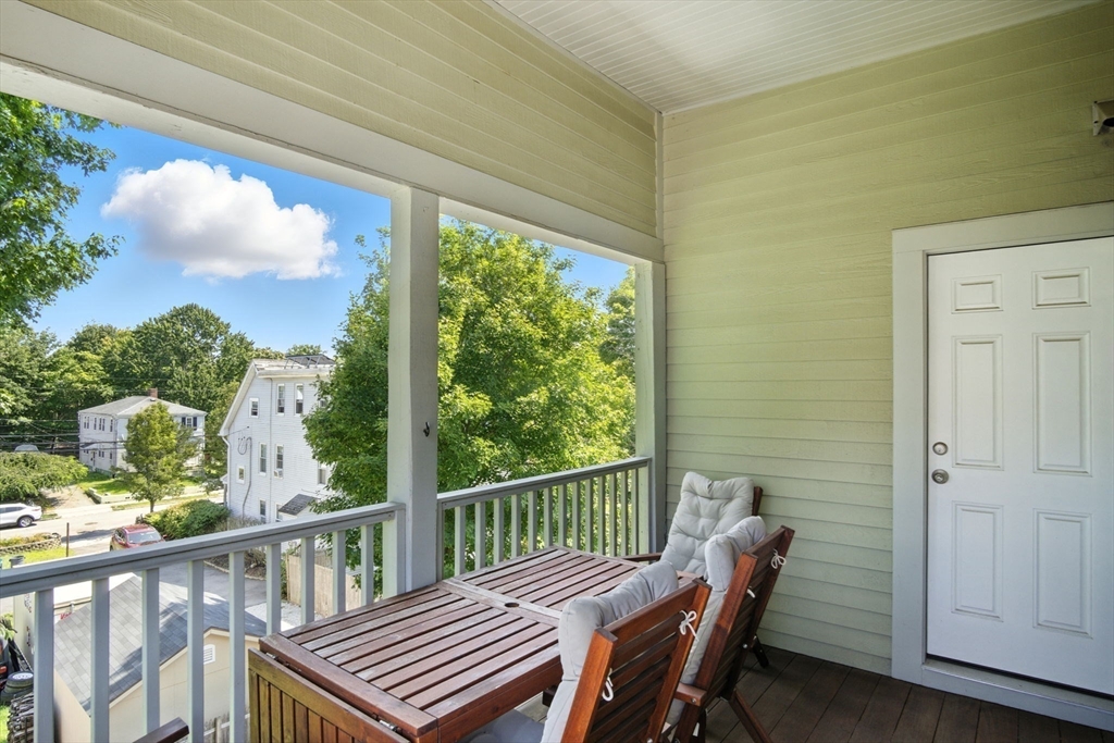 24 Prescott Street, Unit 3 Boston, MA 02136 - Photo 22 of 29 a view of a balcony with chairs