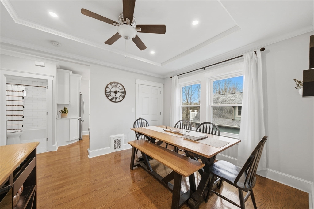 24 Prescott Street, Unit 3 Boston, MA 02136 - Photo 8 of 29 a living room with a table chairs and a window