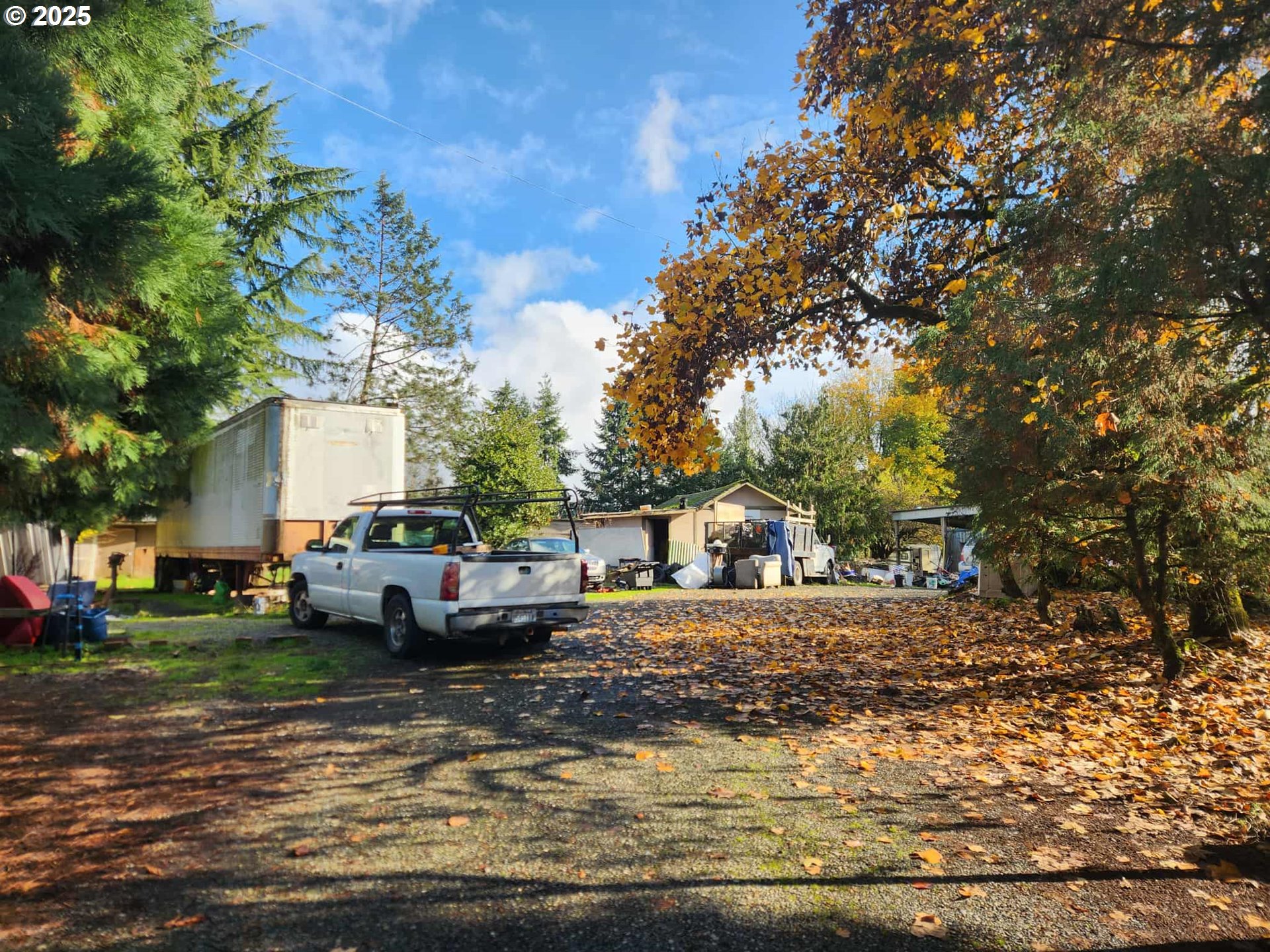 a view of street with parked cars