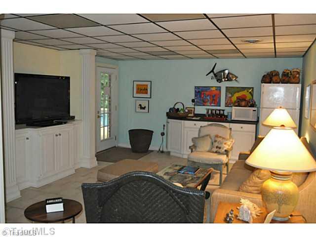 1017 Shamrock Road High Point, NC 27265 - Photo 14 of 16 Home Theatre. The home theater also enjoys a refrigerator and dry bar area.