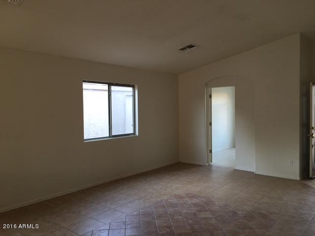 8529 West Cordes Road Tolleson, AZ 85353 - Photo 3 of 15 8529 W Cordes Living 2
