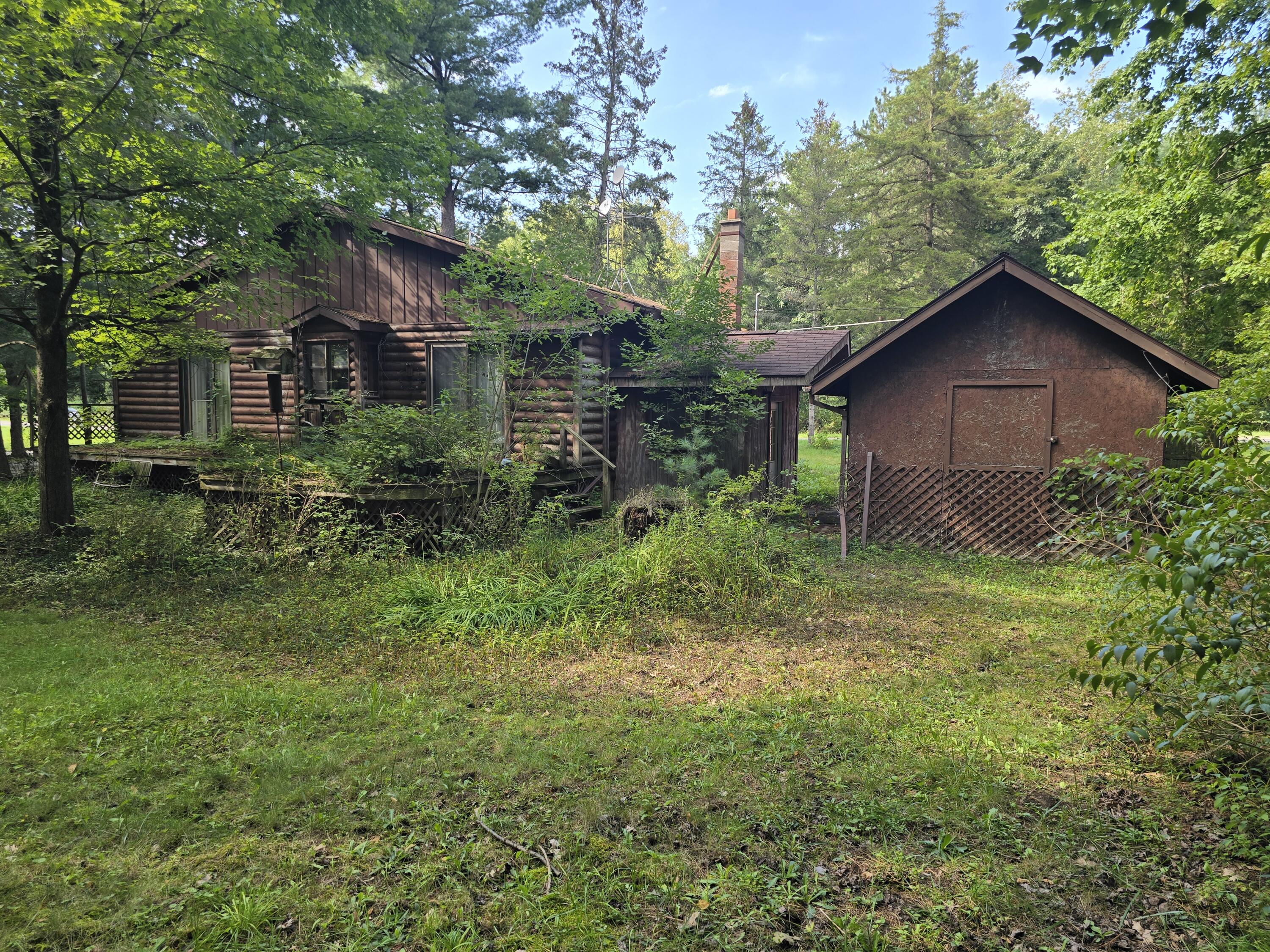 306 Indian Lakes Road Northwest Sparta, MI 49345 - Photo 4 of 25 20260819_164434