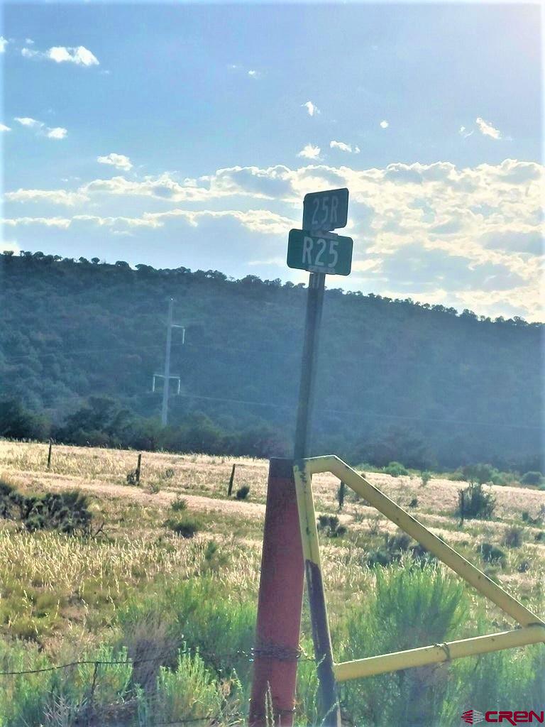 Tbd 25r Road Naturita, CO 81423 - Photo 12 of 16 a view of a lake from a balcony