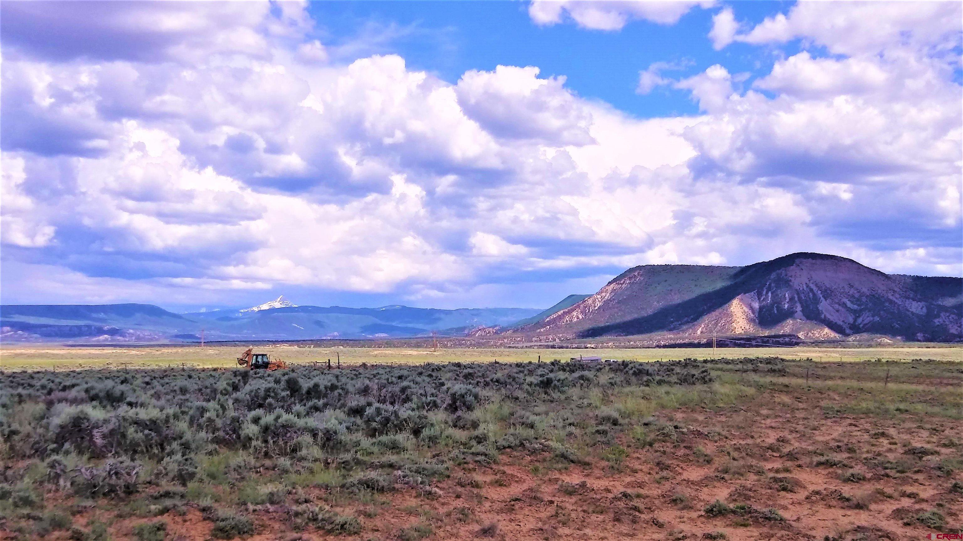 Tbd 25r Road Naturita, CO 81423 - Photo 5 of 16 a view of a field