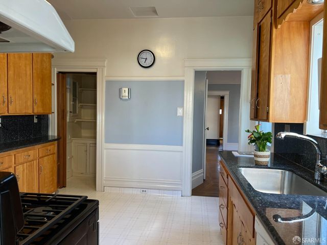 a bathroom with a sink a toilet and a bathtub