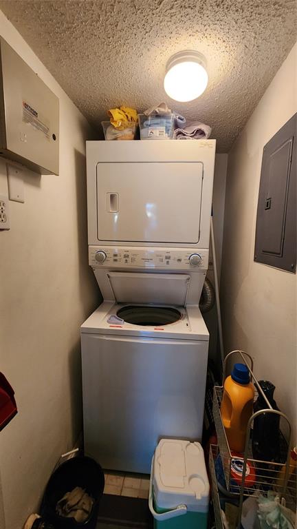 3874 Lyons Road, Unit 103 Pompano Beach, FL 33073 - Photo 3 of 27 a utility room with dryer and washer