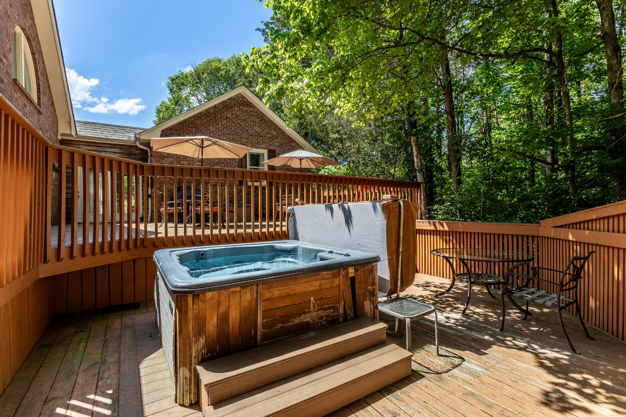 1111 Temple Ridge Court Nashville, TN 37221 - Photo 42 of 46 a view of a roof deck with wooden fence and floor
