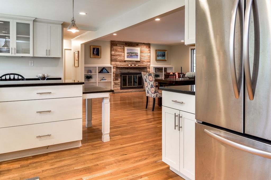 2 Hilltop Road Dover, MA 02030 - Photo 12 of 23 a kitchen with stainless steel appliances granite countertop a refrigerator and a stove top oven