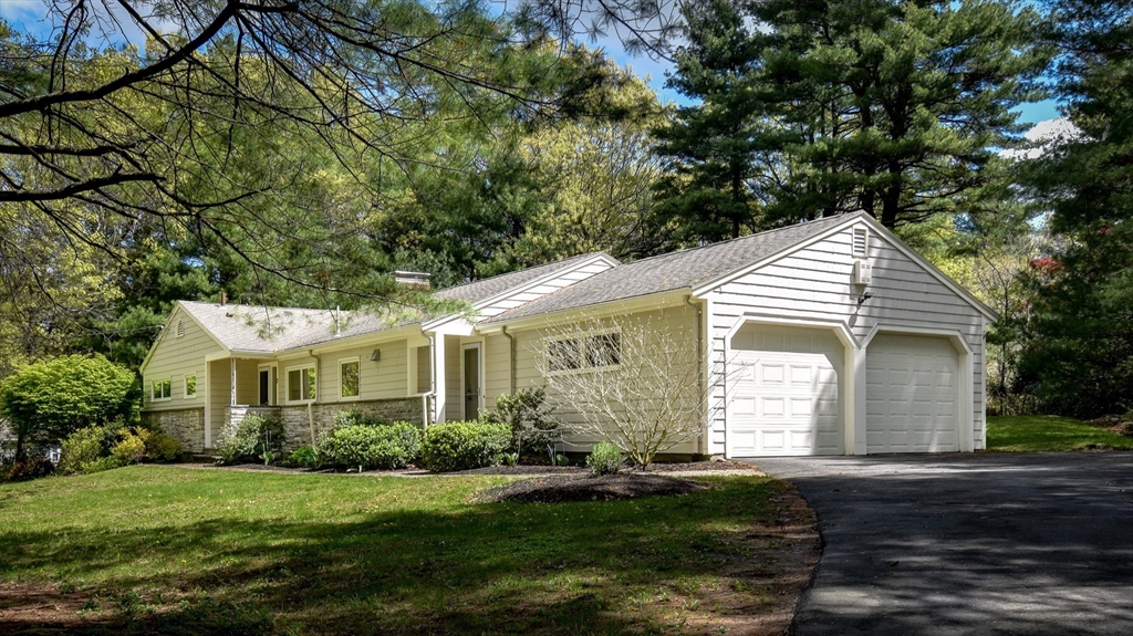 2 Hilltop Road Dover, MA 02030 - Photo 2 of 23 a front view of a house with a yard