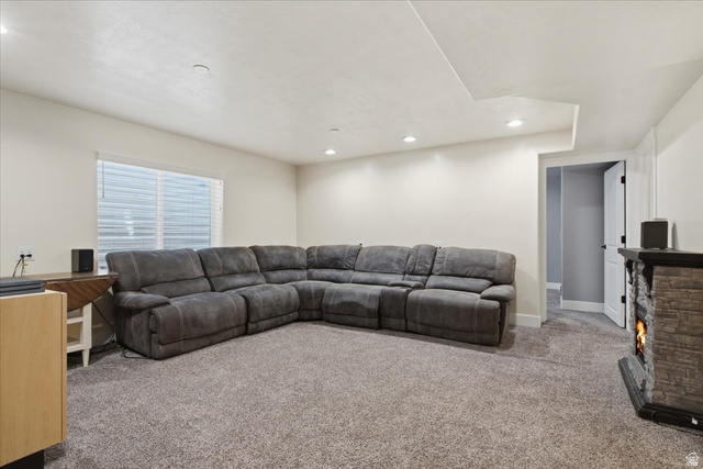 1232 Canyon Road Tooele, UT 84074 - Photo 36 of 54 Spacious room featuring neutral carpeting, recessed lighting, and a window with blinds