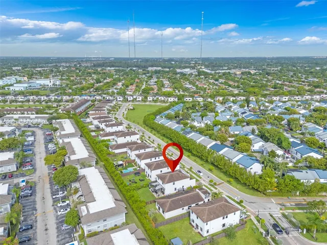 a view of city with tall buildings