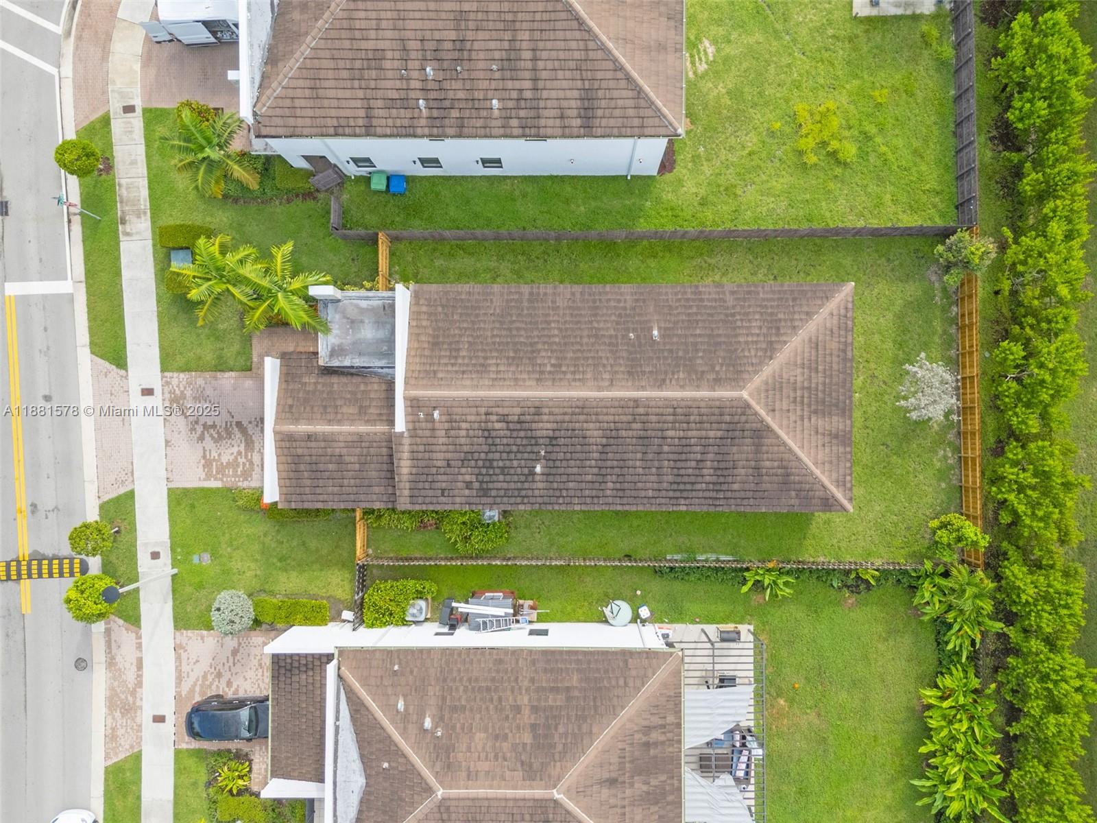 Ives Estates Miami, FL 33179 - Photo 25 of 25 an aerial view of a house with a garden and trees