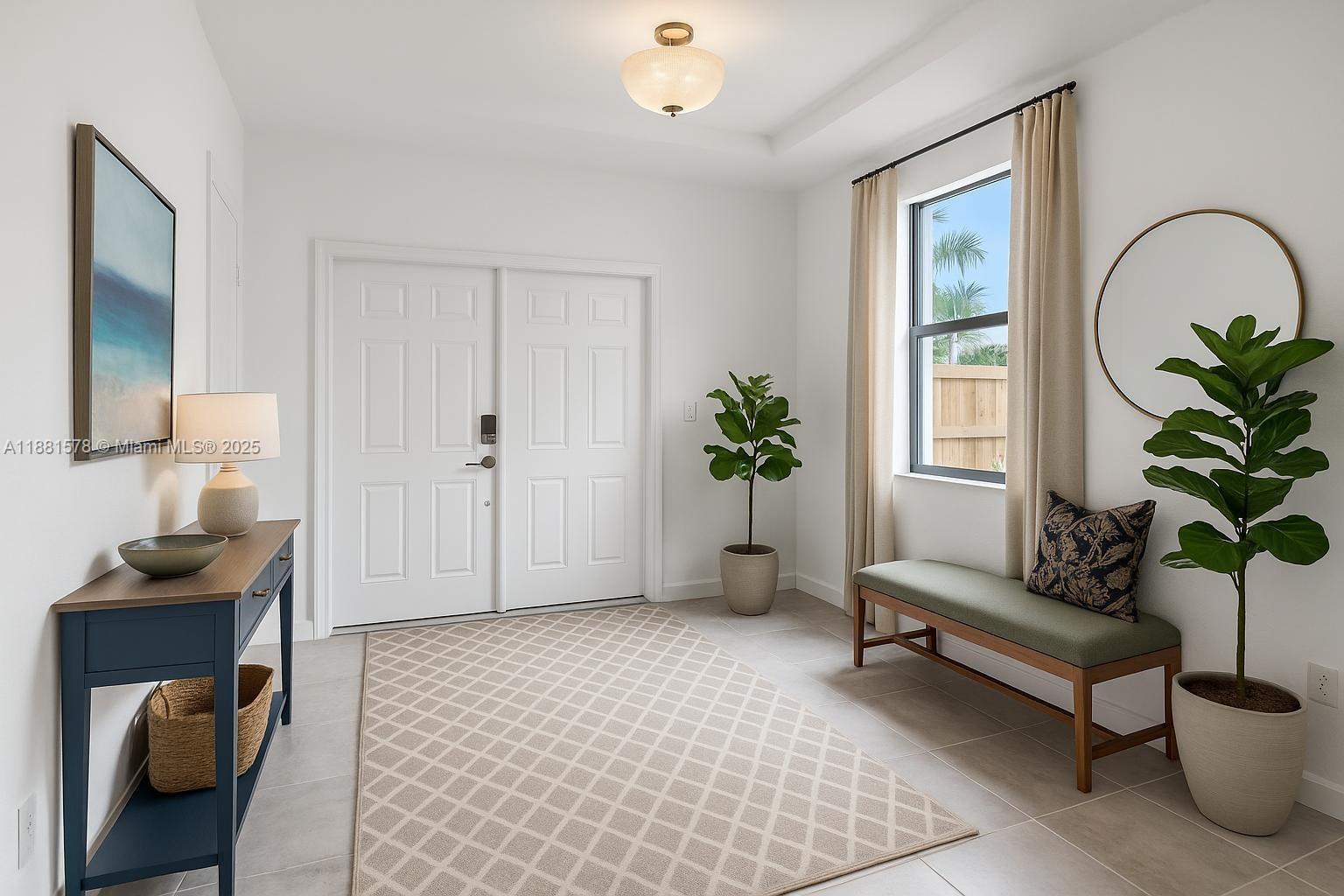 Ives Estates Miami, FL 33179 - Photo 4 of 25 a living room with furniture and a potted plant