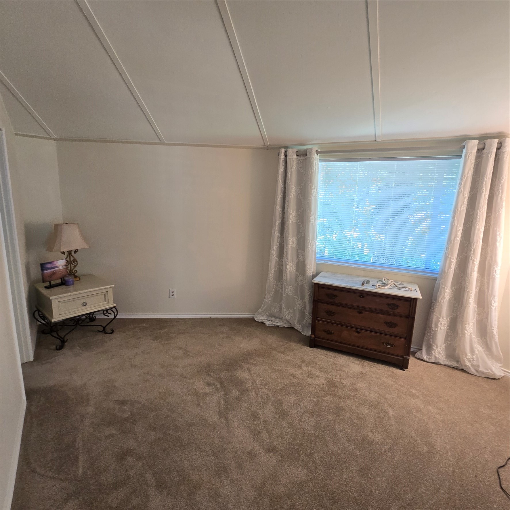 275 Sam Houston Loop Point Blank, TX 77364 - Photo 17 of 34 a room with a window