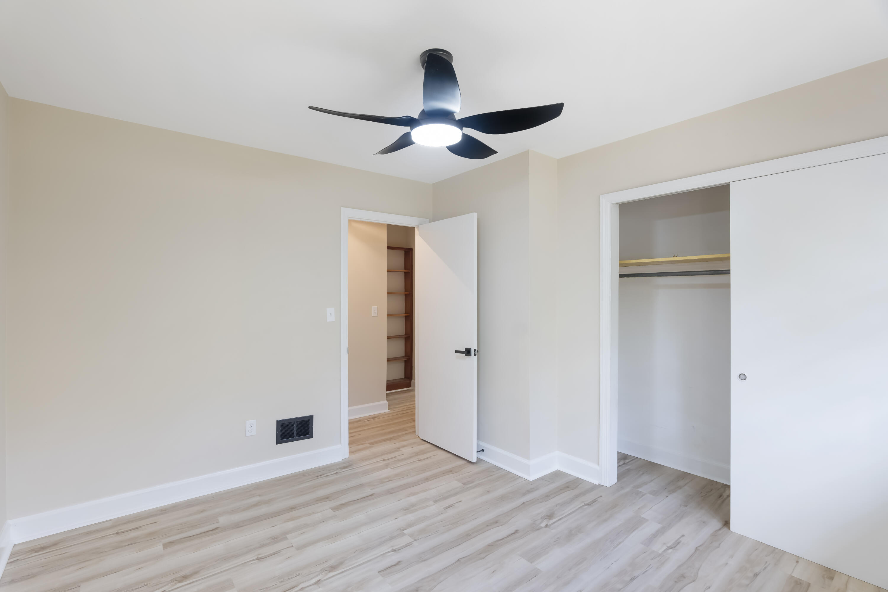 39 Gantt Street Wagener, SC 29164 - Photo 21 of 30 a view of an empty room with wooden floor