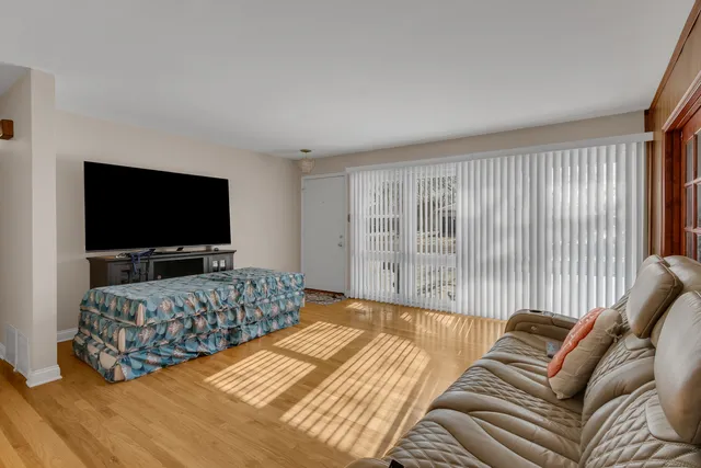 a view of a a dining table and chairs