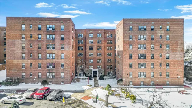a front view of a building with street view