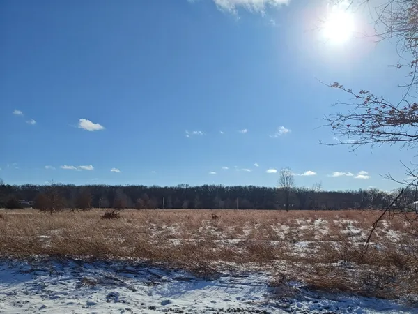 a view of lake and mountain