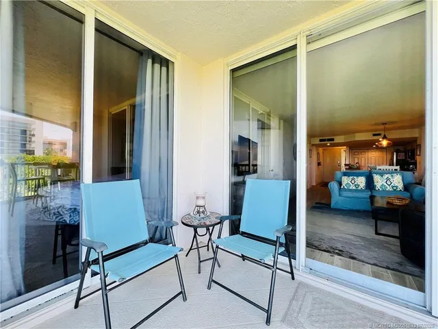 a bathroom with a sink a mirror a toilet and shower