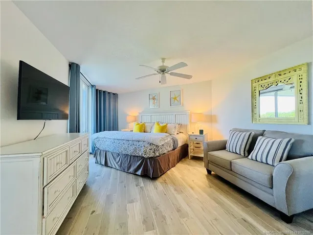 a bathroom with a sink mirror and toilet