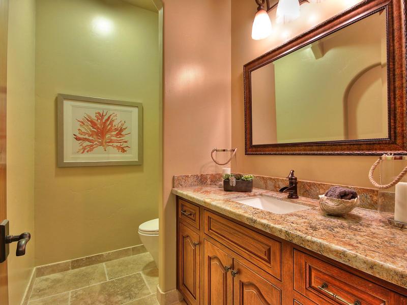 Monterra Oaks Road Monterey, CA 93940 - Photo 18 of 38 a bathroom with a granite countertop sink mirror vanity and toilet