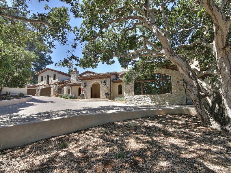 Monterra Oaks Road Monterey, CA 93940 - Photo 2 of 38 a front view of a house with a yard