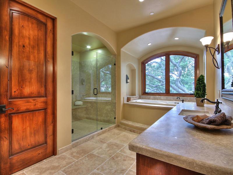 Monterra Oaks Road Monterey, CA 93940 - Photo 23 of 38 a spacious bathroom with a tub and a large window