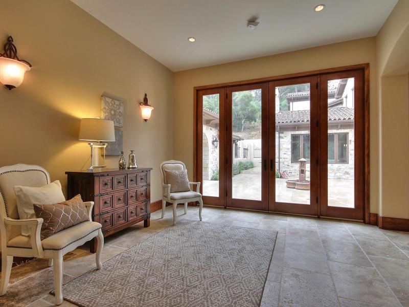 Monterra Oaks Road Monterey, CA 93940 - Photo 25 of 38 a living room with furniture and large windows