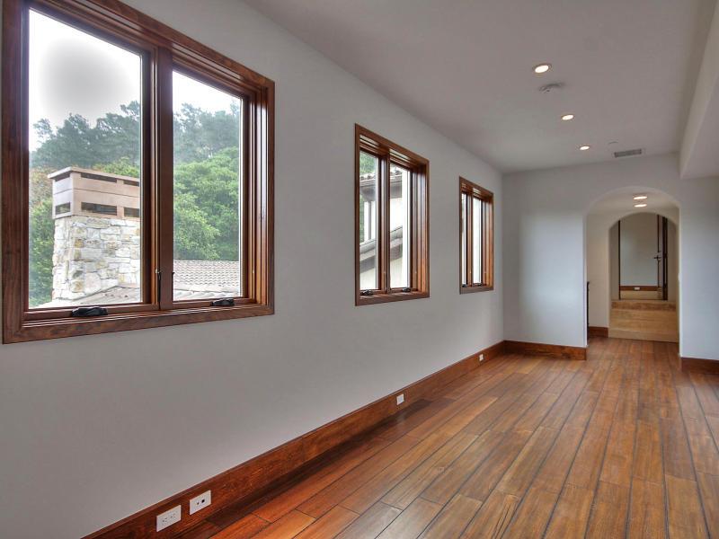 Monterra Oaks Road Monterey, CA 93940 - Photo 26 of 38 a view of an empty room with window and wooden floor