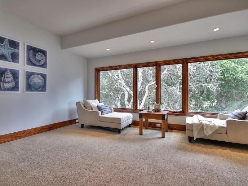 Monterra Oaks Road Monterey, CA 93940 - Photo 28 of 38 a living room with furniture and a large window