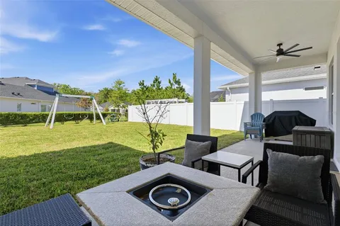 a view of an chairs and tables in the patio