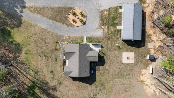 a kitchen with granite countertop a sink and a stove