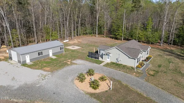 a room with furniture and wooden floor