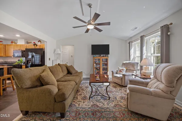 a bed room with a bed and a couch