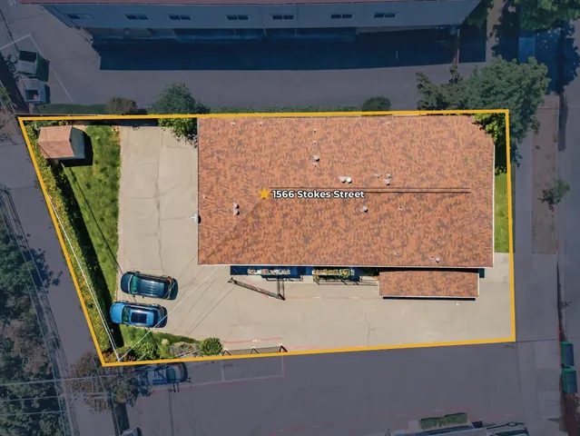 a view of a house with a street