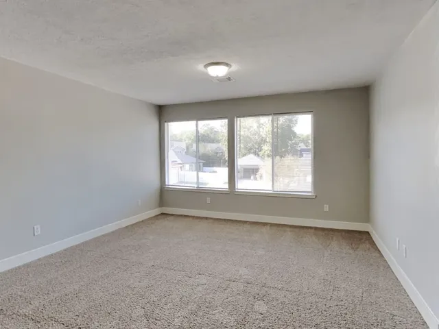 an empty room with a window