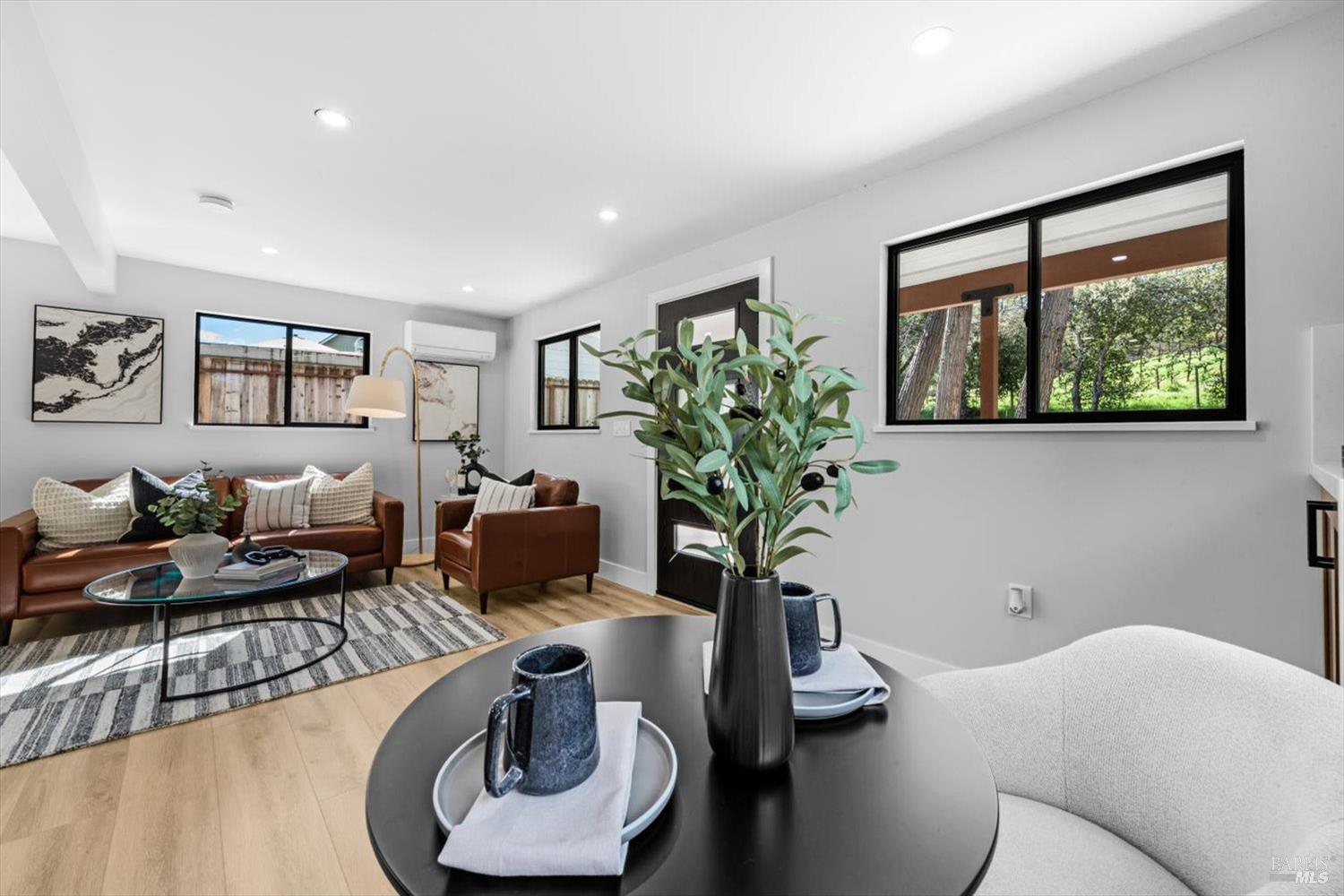 2192 First Avenue Napa, CA 94558 - Photo 17 of 81 a living room with furniture and a potted plant