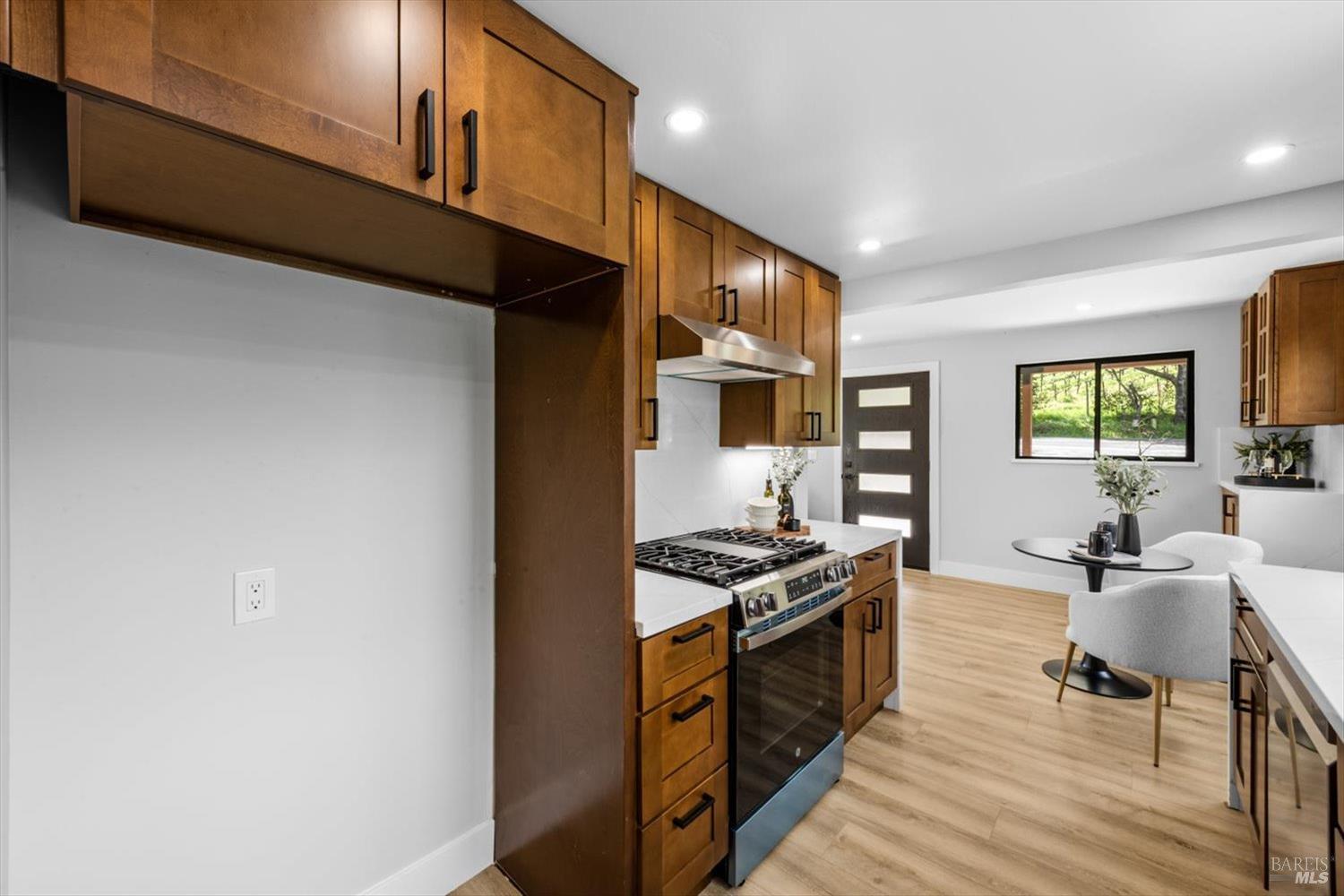 2192 First Avenue Napa, CA 94558 - Photo 24 of 81 a kitchen with stainless steel appliances granite countertop a stove a sink and a refrigerator