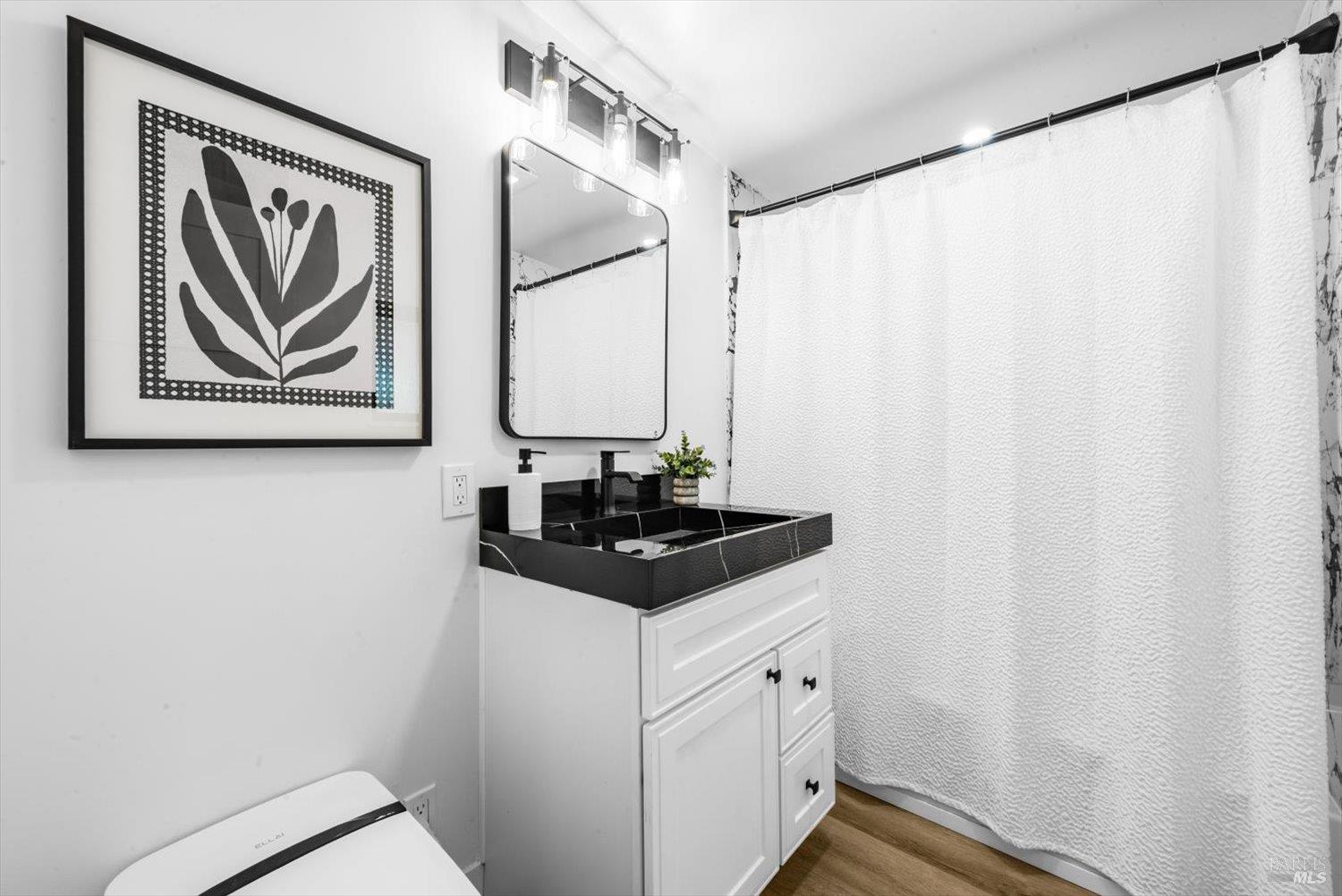 2192 First Avenue Napa, CA 94558 - Photo 33 of 81 a bathroom with a sink and a mirror