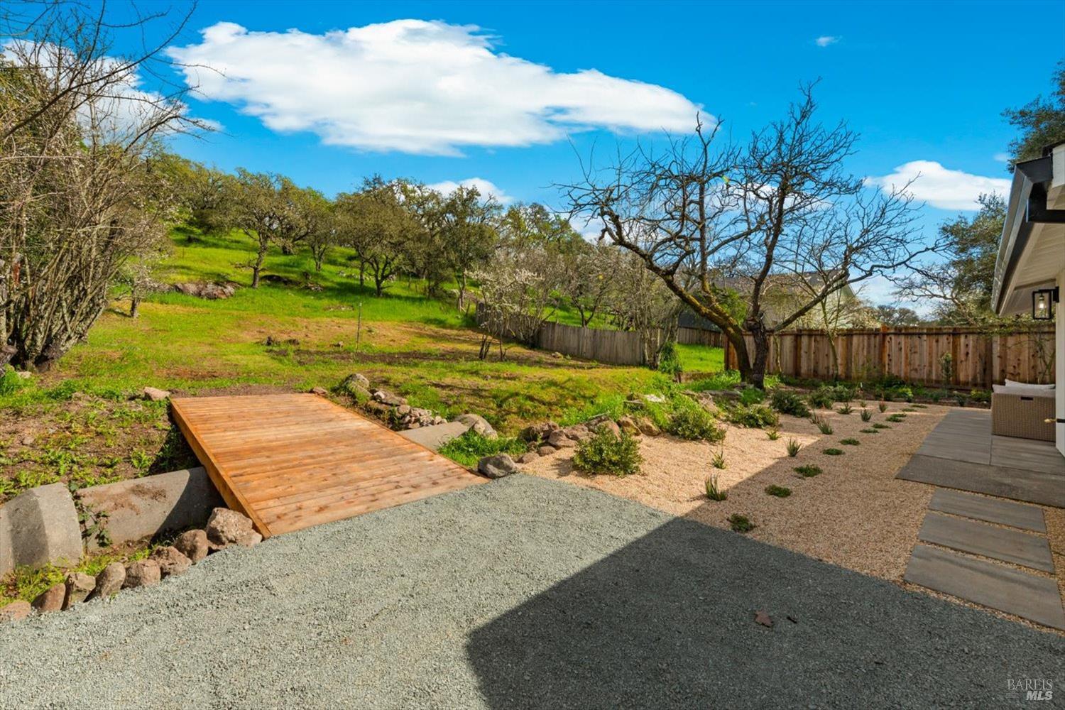 2192 First Avenue Napa, CA 94558 - Photo 59 of 81 a view of a backyard with plants and lake view