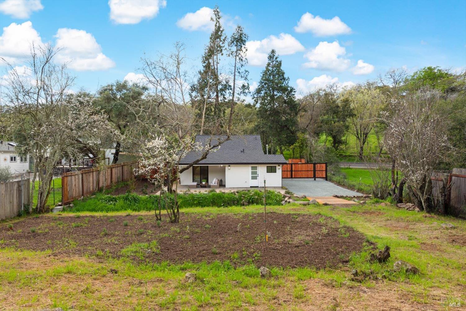 2192 First Avenue Napa, CA 94558 - Photo 61 of 81 a front view of a house with a yard and trees