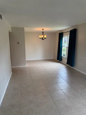 a view of a livingroom with a staircase