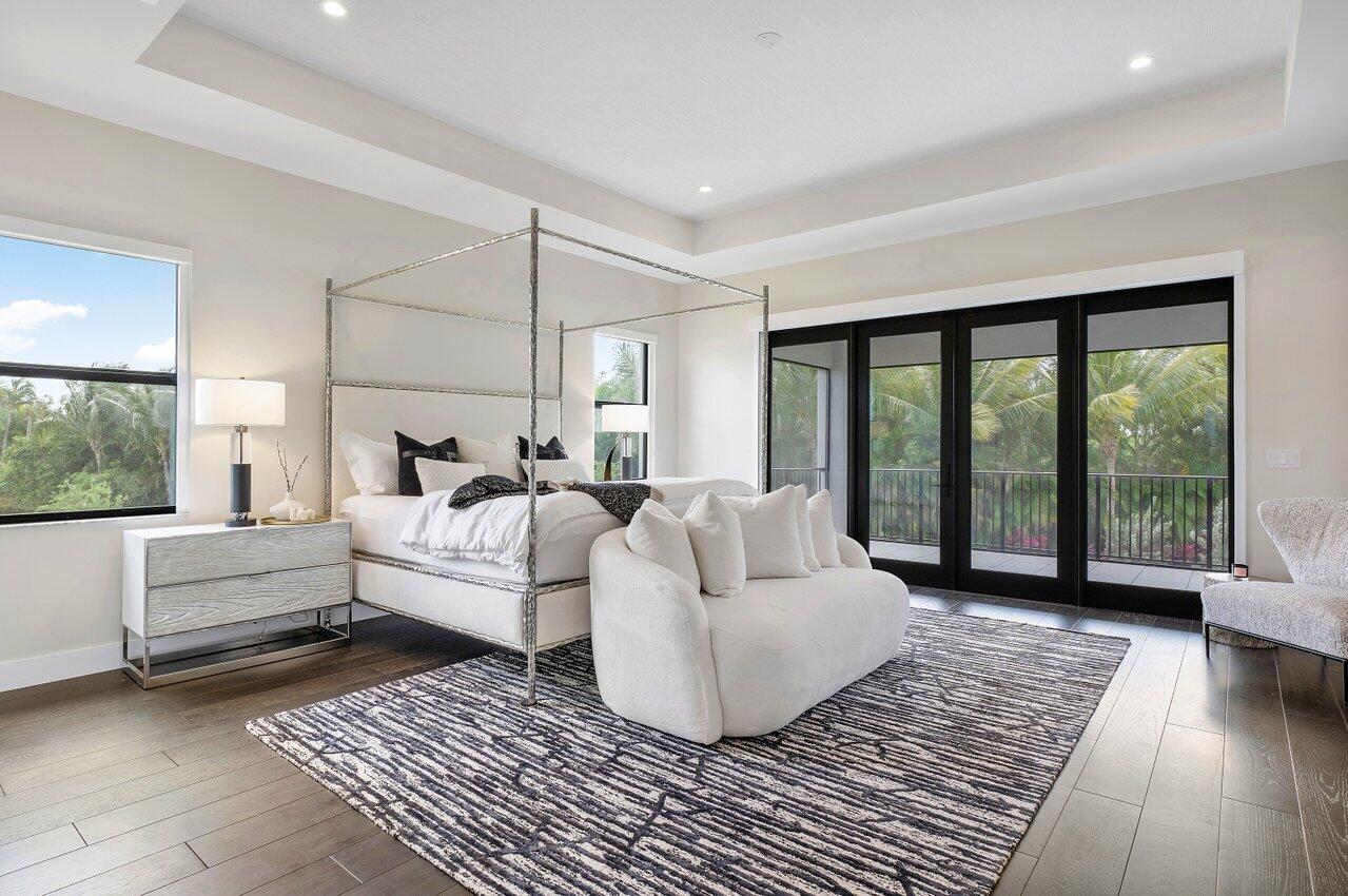 17464 Ponte Chiasso Drive Boca Raton, FL 33496 - Photo 18 of 37 a living room with furniture and large windows