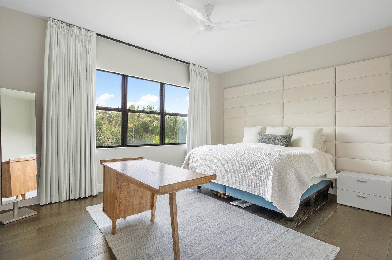 17464 Ponte Chiasso Drive Boca Raton, FL 33496 - Photo 28 of 37 a bedroom with a bed and a large window