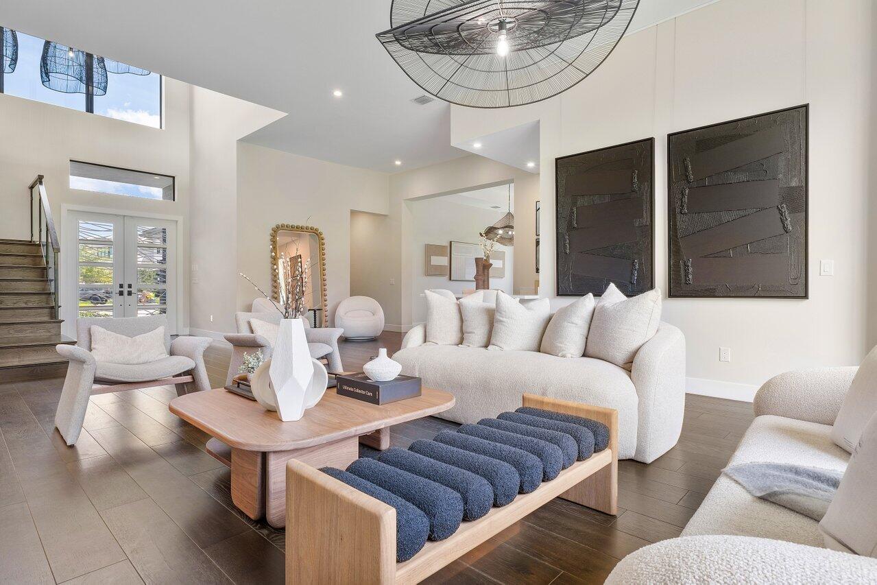 17464 Ponte Chiasso Drive Boca Raton, FL 33496 - Photo 3 of 37 a living room with furniture