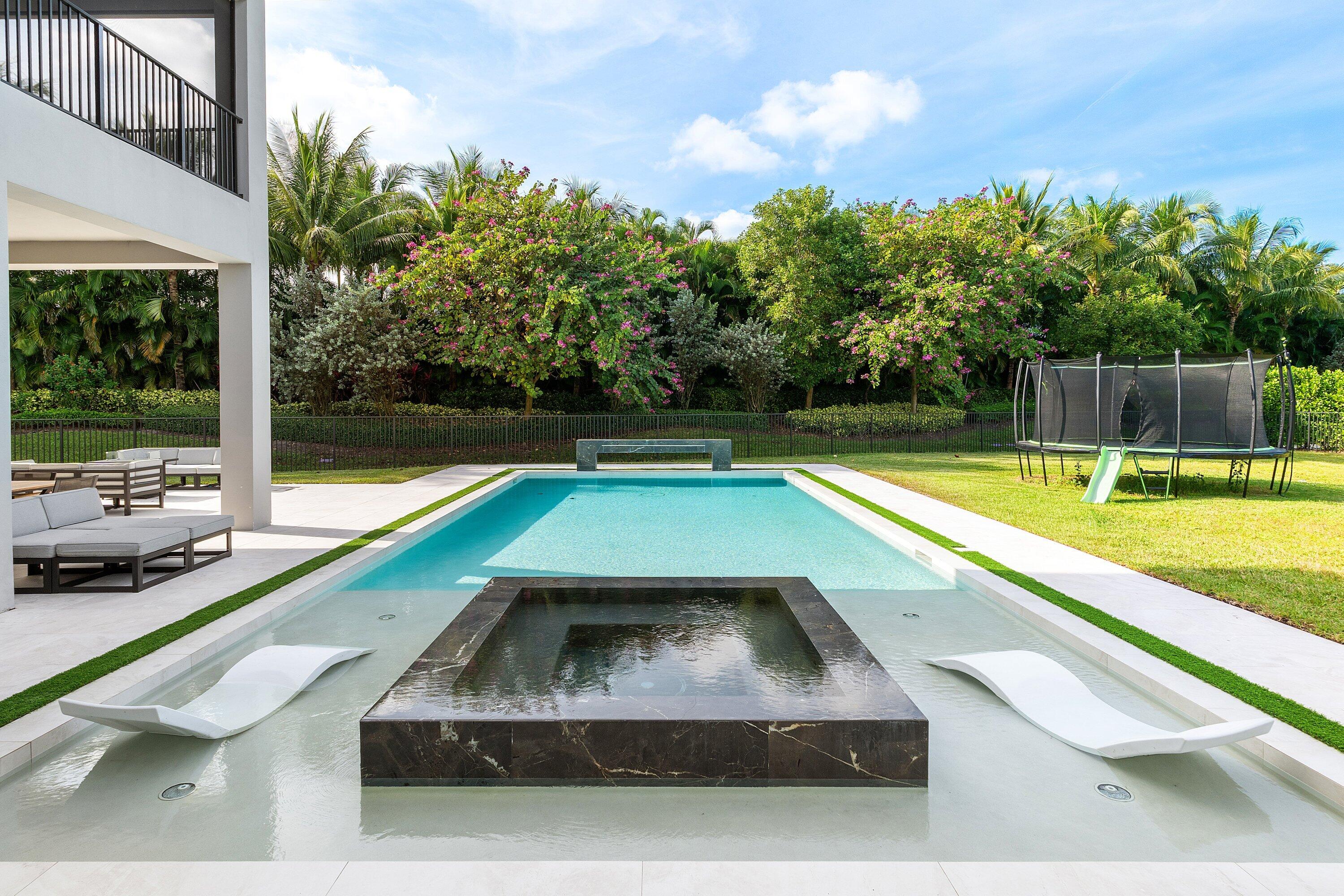 17464 Ponte Chiasso Drive Boca Raton, FL 33496 - Photo 31 of 37 a view of swimming pool with chairs