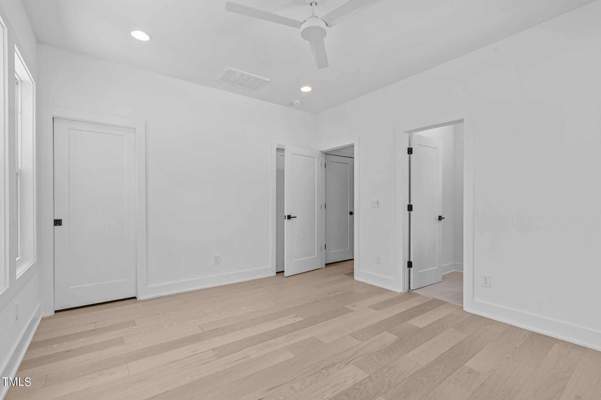 853 Athens Drive, Unit 101 Raleigh, NC 27606 - Photo 33 of 61 a view of an empty room